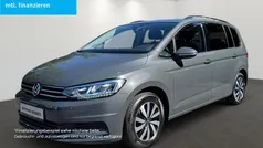 Grau Gebraucht 2022 VW Touran Comfortline Van / Kleinbus | 27.290 € (Fairer Preis)