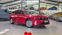Red metallic Gebraucht 2024 Opel Astra Enjoy Kombi | 19.850 € (Fairer Preis)