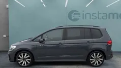 Grau Gebraucht 2024 VW Touran Pro Van / Kleinbus | 38.098 € (Fairer Preis)