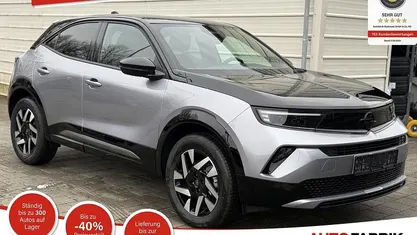 Neu Opel Mokka 145 PS (106 kW) 2025 Tropikal grün metallic / schwarzes dach SUV