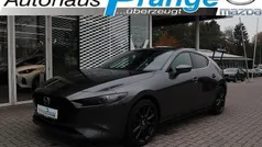 Machine gray Gebraucht 2024 Mazda 3 Exclusive-Line Limousine | 28.485 € (Fairer Preis)