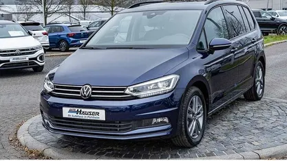 Second-hand VW Touran Comfortline 150 CP (110 kW) 2025 Albastru Monovolum