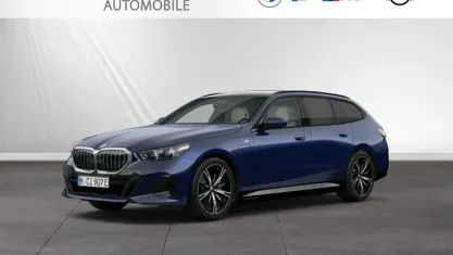 Gebraucht BMW 550e M Sport 489 PS (359 kW) 2025 Bmw individual tansanitblau metallic Kombi