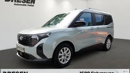 Grau Gebraucht 2024 Ford Tourneo Courier Titanium Van / Kleinbus | 23.690 € (Fairer Preis)