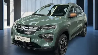 Gebraucht Dacia Spring Extreme 47 kW (65 PS) 2023 Olivgrün Kleinwagen