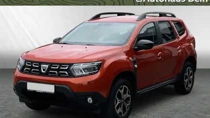 Używany Dacia Duster Comfort 101 KM (74 kW) 2021 Pomarańczowy SUV