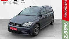 Grau Gebraucht 2024 VW Touran Pro Van / Kleinbus | 36.950 € (Fairer Preis)