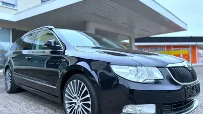 Używany Skoda Superb LAURIN & KLEMENT 170 KM (125 kW) 2013 Czarny Kombi