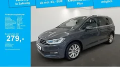 Grau Gebraucht 2021 VW Touran Highline Van / Kleinbus | 29.490 € (Fairer Preis)