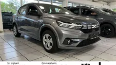 Dolomit grau Gebraucht 2024 Dacia Sandero Comfort Kleinwagen | 18.614 € (Fairer Preis)