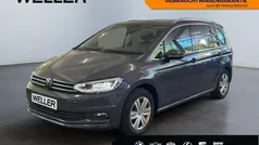Grau Gebraucht 2022 VW Touran Highline Van / Kleinbus | 28.380 € (Fairer Preis)