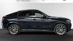 Carbonschwarz metallic Gebraucht 2022 BMW X6 M Sport SUV | 62.490 € (Superpreis)