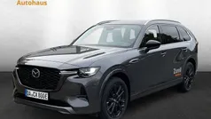 Machine gray Gebraucht 2024 Mazda CX-80 Homura-Line SUV | 54.880 € (Fairer Preis)