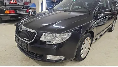 Gebraucht Skoda Superb GreenLine 105 PS (77 kW) 2012 Schwarz Kombi