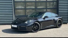 Tiefschwarzmetallic Gebraucht 2023 Porsche 911 Carrera Coupé | 125.990 €