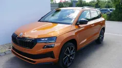 Phoenix orange metallic Gebraucht 2024 Skoda Karoq SportLine SUV | 32.290 € (Fairer Preis)