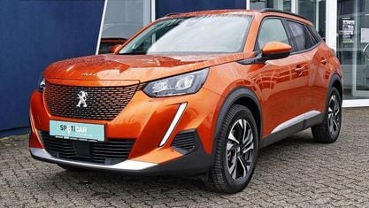 Second-hand Peugeot e-2008 Allure 100 kW (136 CP) 2022 Portocaliu SUV