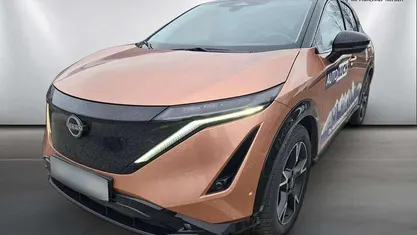Akatsuki copper/pearl black Gebraucht 2024 Nissan Ariya Evolve SUV | 53.300 € (Fairer Preis)