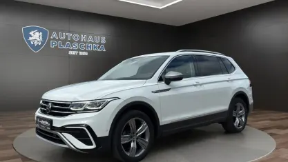 Gebraucht VW Tiguan Allspace Elegance 245 PS (180 kW) 2023 Pure white (weiß) SUV