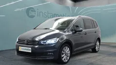 Grau Gebraucht 2024 VW Touran Pro Van / Kleinbus | 36.849 € (Fairer Preis)