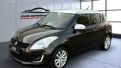 Używany Suzuki Swift Comfort 94 KM (69 kW) 2015 Brązowy Hatchback