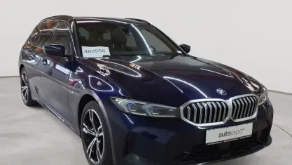Gebraucht BMW 330e M Sport 184 PS (135 kW) 2023 Tansanitblau metallic Kombi