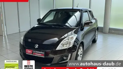 Gebraucht Suzuki Swift Comfort 94 PS (69 kW) 2015 Bison brown metallic Kleinwagen