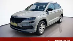 Grau Gebraucht 2021 Skoda Karoq SportLine SUV | 28.380 € (Fairer Preis)