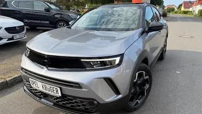Usado Opel Mokka Ultimate 131 HP (96 kW) 2023 Cinzento SUV