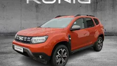 Arizonaorange metallic Gebraucht 2024 Dacia Duster Journey SUV | 23.399 € (Fairer Preis)