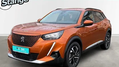 Gebraucht Peugeot e-2008 Allure 100 kW (136 PS) 2021 Orange SUV