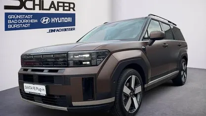 Earthy brass / mat Gebraucht 2025 Hyundai Santa Fe Signature SUV | 46.480 € (Guter Preis)