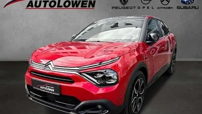 Elixirrot (perlmuttlackierun Gebraucht 2024 Citroën e-C4 Shine Limousine | 23.890 € (Fairer Preis)