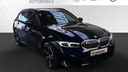 Gebraucht BMW 330e M Sport 292 PS (214 kW) 2024 Bmw individual tansanitblau metallic Kombi