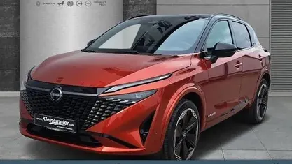 Reddish orange/black Gebraucht 2024 Nissan Qashqai Comfort SUV | 33.580 € (Guter Preis)