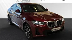 Aventurinrot metallic Gebraucht 2024 BMW X4 M Sport SUV | 55.555 € (Fairer Preis)