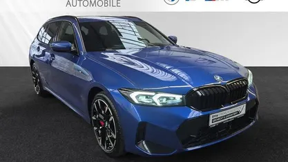 Gebraucht BMW 330e M Sport 292 PS (214 kW) 2024 Portimao blau metallic Kombi