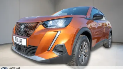 Gebraucht Peugeot e-2008 Active 100 kW (136 PS) 2022 Orange SUV