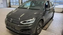 Grau Gebraucht 2022 VW Touran Highline Van / Kleinbus | 29.848 € (Fairer Preis)