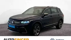 Atlantic blue metallic Gebraucht 2024 VW Tiguan Allspace R-line SUV | 47.780 € (Fairer Preis)