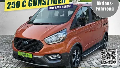 Gebraucht Ford Tourneo 170 PS (125 kW) 2023 Orange glow metallic Van / Kleinbus