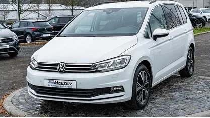Second-hand VW Touran Highline 150 CP (110 kW) 2021 Alb Monovolum