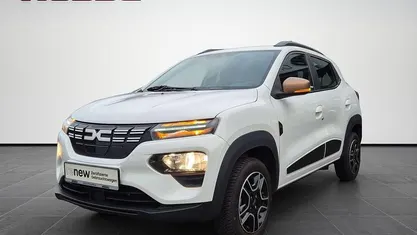 Gebraucht Dacia Spring Extreme 47 kW (65 PS) 2023 Kaolinweiss Kleinwagen
