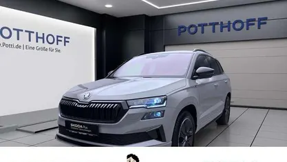 Stahlgrau Gebraucht 2024 Skoda Karoq SportLine SUV | 32.997 € (Superpreis)