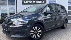 Uranograu Gebraucht 2024 VW Touran Move Van / Kleinbus | 34.979 € (Fairer Preis)