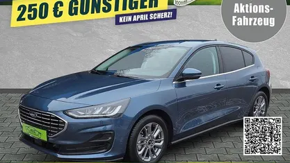 Gebraucht Ford Focus Titanium 125 PS (91 kW) 2024 Chrome blue metallic Limousine
