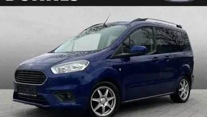 Gebraucht Ford Tourneo Courier Titanium 101 PS (74 kW) 2018 Blau (indicblau metallic) Van / Kleinbus