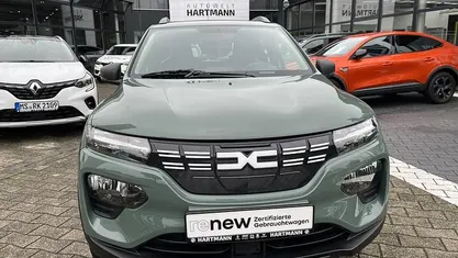 Gebraucht Dacia Spring Essentiel 44 kW (61 PS) 2023 Olivgrau (grün) Kleinwagen