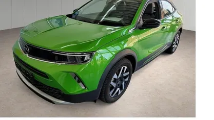 Gebraucht Opel Mokka-e Elegance 100 kW (136 PS) 2022 Matcha green/ikone gruen SUV