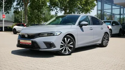 Gebraucht Honda Civic Elegance 184 PS (135 kW) 2024 Sonic gray pearl Limousine
